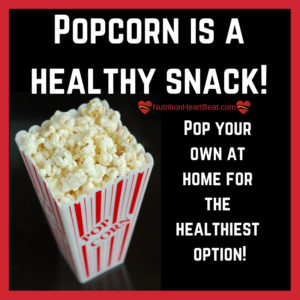 Popcorn in a movie box as a snack for nutritious athletes on the go.
